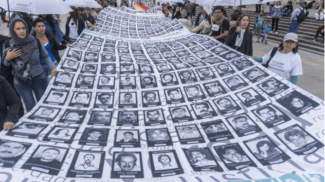 Protesta en Bogotá en el primer aniversario del Acuerdo de Paz. Imagen: Daniel Garzon Herazo / NurPhoto / Sipa USA / PA Images. Todos los derechos reservados.